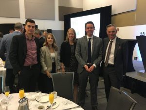 Five Hendry Warren staff at a breakfast event