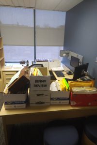 Boxes of files on a desk