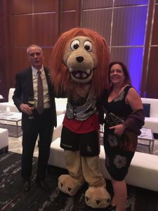 Ian Hendry and Marie Fraser with a mascot