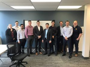 Hendry Warren staff in a conference room